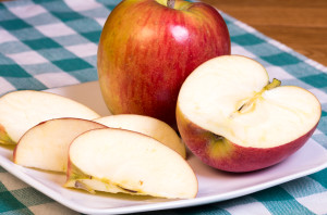 apple and apple slices on a plate