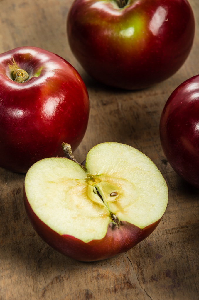 Fresh Macintosh apples cut in half Fresh From Oregon
