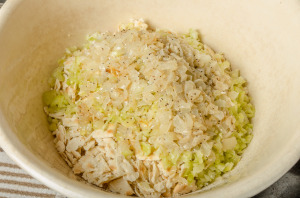 Cracker, onions and celery in vintage bowl